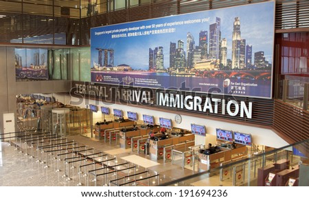 SINGAPORE - JANUARY 6: Changi International Airport on January 6, 2014 in Singapore. Singapore airport is the main aviation hub in Southeast Asia, handling 66 million passengers per year.
