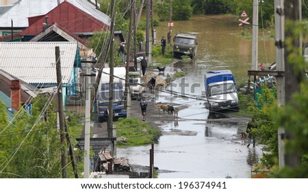 BIYSK, ALTAI  KRAI-JUNE 1: Flood water on the streets on June 01.2014 in Biysk, Altai krai. The city declared a state of emergency as floods tore into the city.
