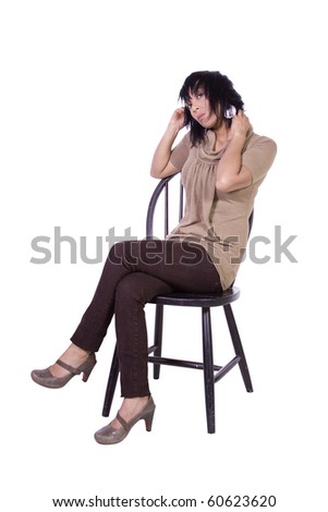 Beautiful Woman Posing on a Chair - Isolated White Background