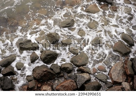 Similar – Image, Stock Photo Stony seashore and waves at beautiful sunset