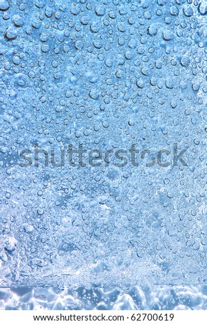 Lots of blue bubbles in water, close-up shot