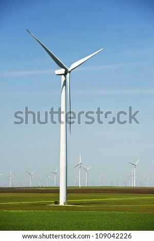 Large Wind Turbines Vertical Photography. American Midwest Landscape
