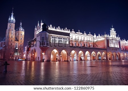 Krakow Medieval Main Square. Krakow (Cracow) Poland. Main Square at Night. St. Mary\'s Basilica and Sukiennice ( Cloth Hall ). Poland Photography Collection.