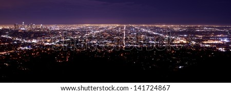 Los Angeles Metro Area Night Time Panorama. Los Angeles Downtown on the Left Side. American Cities Photo Collection.