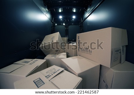 Cardboard Moving Boxes in the Large Commercial Van Cargo Area.