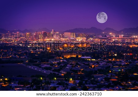 Phoenix Arizona Skyline at Night. Full Moon Over Phoenix, Arizona, United States.