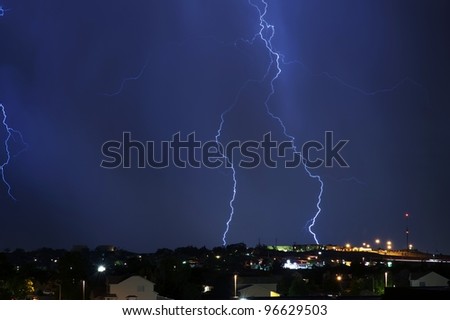 Electric Storm Above the City. Night Stormy Sky. Severe Weather Photo Collection.