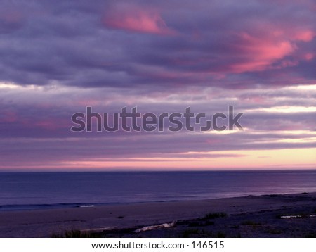 sky and clouds over north shore of  St Lawrence river, Quebec, Canada, artistically toned and blurred