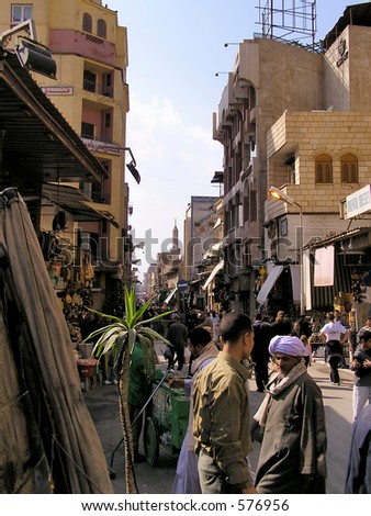 Typical bazaar scene of merchants  bargaining in the Bazaar or souk Khan el-Khalili,  Cairo, Africa