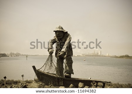 The Fisherman, a memorial statue created by artist Dick Crane, commemorating the mariners who lost their lives at sea and  view of Indian Island  Woodley Island, California - sepia tone