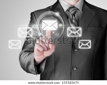 Man hand pressing mail symbol.