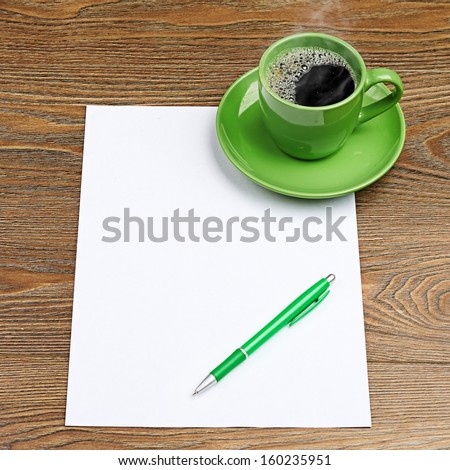 green coffee cup on white blank