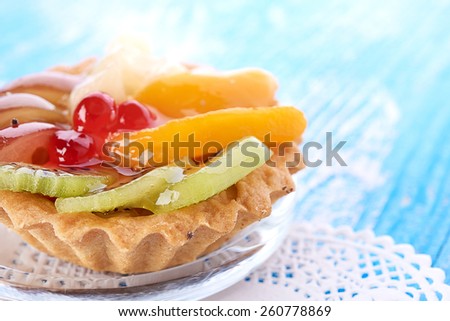 sweet cake with fruits on plate