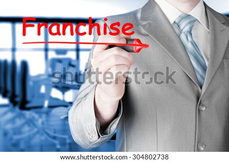 business man writing franchise