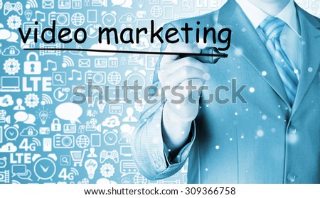 business man writing Video Marketing