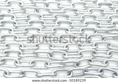 Long silver chain arranged as the background