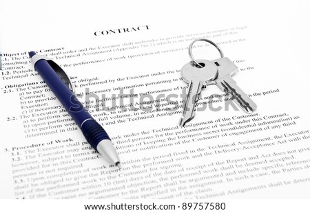legal contract papers with pen and glasses