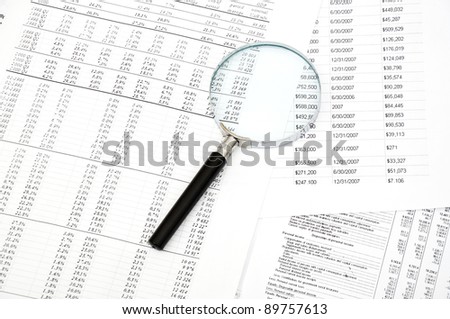 chrome Magnifying Glass and document close up