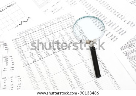 chrome Magnifying Glass and document close up
