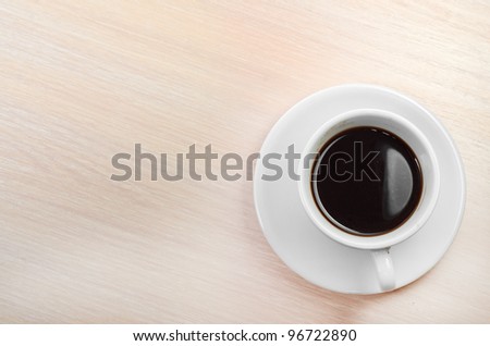 coffee classic cup on a wooden table top view