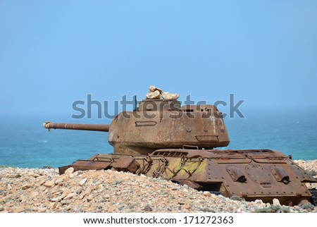 Rusty soviet battle tank T-34 on the shore of Indian ocean at the Socotra Island, Yemen