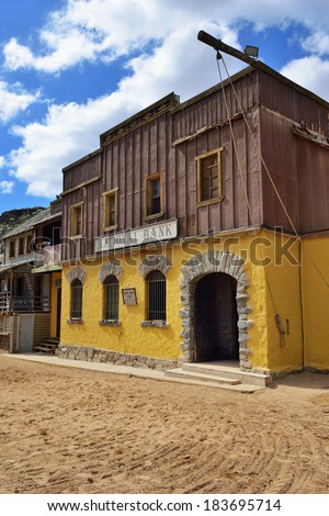 SIOUX CITY, GRAN CANARIA -  FEB 20, 2014: Street of wild west town with bank building in Sioux City. Popular tourist attraction in Gran Canaria island