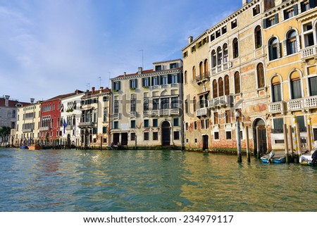 VENICE, ITALY - SEPT 24, 2014: View on the Grand Canal in Venice at sunset. The Grand Canal is the largest canal in Venice, Italy.