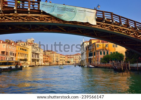 VENICE, ITALY - SEPT 27, 2014: View from Grand Canal on the Accademia bridge in Venice  at sunset. The Grand Canal is the largest canal in Venice, Italy.
