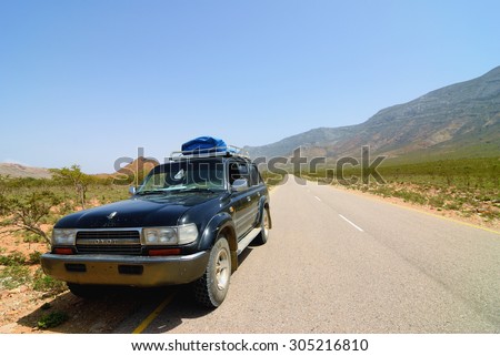 YEMEN - MARCH 07, 2010: Off-road car on the road, Socotra island. Off-road safari is one of the main local tourist attraction in Socotra