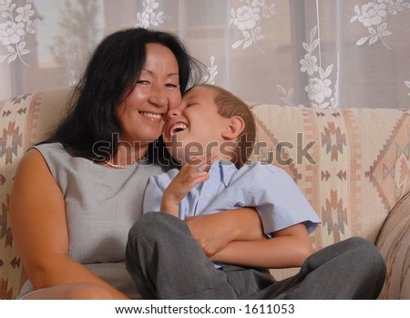 Business woman and son having fun