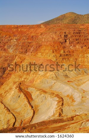 Excavated sides of open pit mine