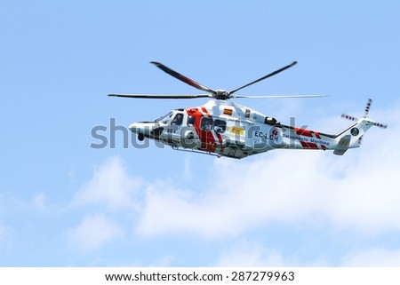 ALICANTE COAST, SPAIN - JUNE 14: Helicopter of the Spanish  Maritime Rescue Team finding injured over Cabo La Nao beach, on june 14, 2015 in Alicante coast.