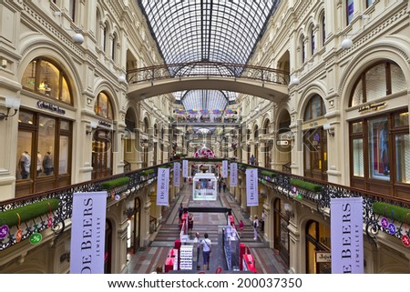 MOSCOW - JUNE 9, 2014: Inside famous GUM the large store in the Kitai-gorod part of Moscow facing Red Square. It is currently a shopping mall.