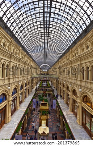 MOSCOW - JUNE 18, 2014: Inside famous GUM the large store in the Kitai-gorod part of Moscow facing Red Square. It is currently a shopping mall.