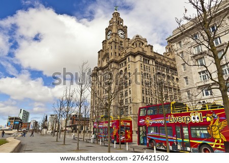 LIVERPOOL, UK - MAY 3, 2015: Cityscape at the Pier Head the city centre of Liverpool, England part of the Liverpool Maritime Mercantile City UNESCO World Heritage Site