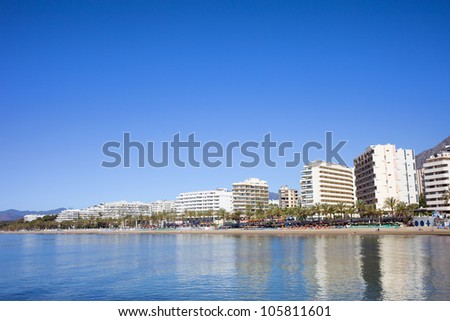 City of Marbella popular resort on Costa del Sol by the Mediterranean Sea in Southern Andalusia, Spain, composition with space for text.