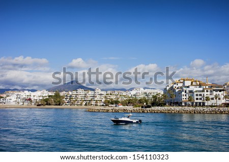 Puerto Banus skyline, apartment buildings by the Mediterranean Sea on Costa del Sol, Andalusia, Spain.