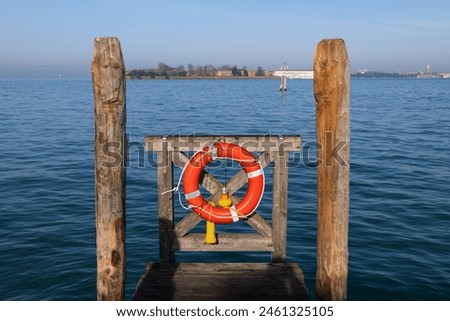 Similar – Foto Bild Rettungsring auf Steg an Anlegestelle