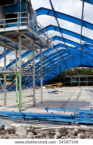 Metal frame structure on deconstruction site of the shopping mall building