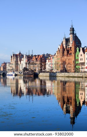 Old Town skyline historic architecture with reflection on the Motlawa river, city of Gdansk, Poland.