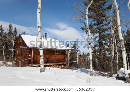 Log cabin ready for winter guests to relax in remote rural location.