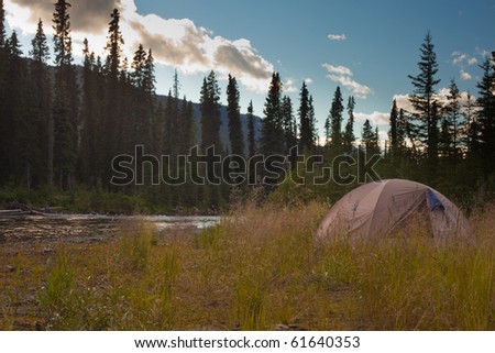 Tent on bank of Big Salmon River, Yukon T., Canada