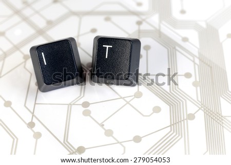 IT Help desk - Two Black Keyboard keys with letters I and T on White Circuit Board Background
