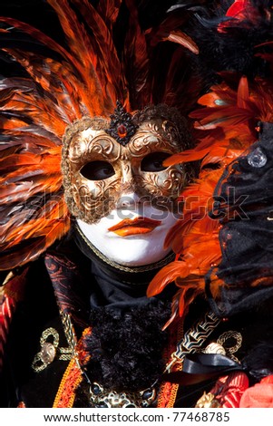 VENICE, ITALY - MARCH: Participant with a mask on in St. Mark's Square, Carnival of Venice on March 7, 2011 in Venice, Italy. The carnival was held from February 26 to March 8, 2011.