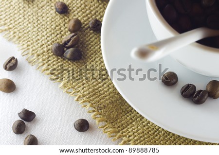 a cup of the fresh coffee on table