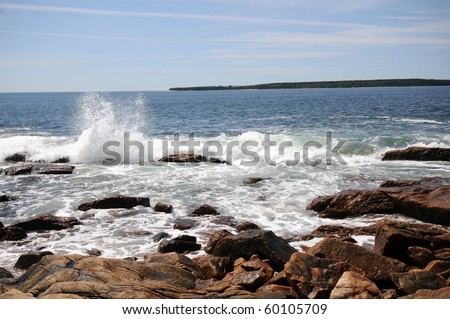 water splashes on rocks along Main coastline