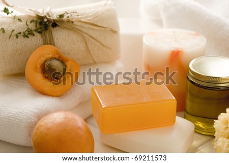 An assortment of apricot spa treatment products.