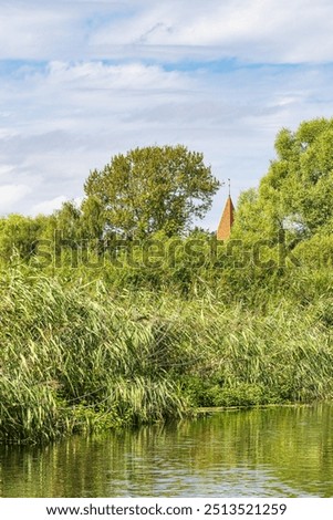 Similar – Image, Stock Photo View over the Warnow river to the city of Rostock in the evening