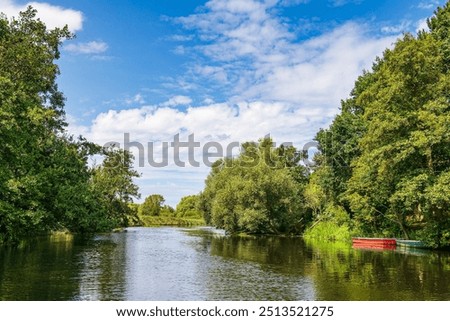 Similar – Image, Stock Photo View over the Warnow river to the city of Rostock in the evening