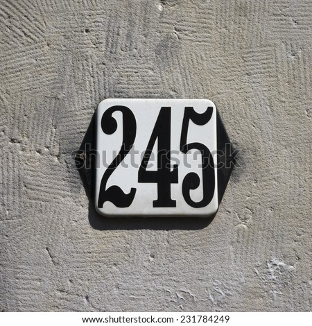 enameled house number two hundred and forty five.
